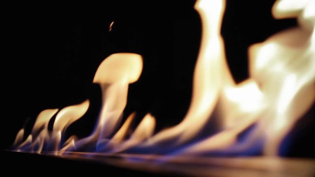 Biofireplace burn on ethanol gas. Modern smart ecological alternative technologies. Close up flame shooting