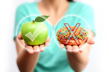 Healthy lifestyle concept, choose healthy fruits and not processed sweets
