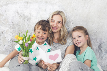 Happy Family - Children congratulate their mom on Mother's Day