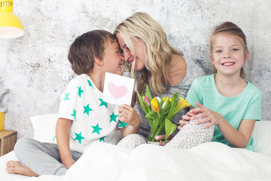 Happy Family - Children congratulate their mom on Mother's Day