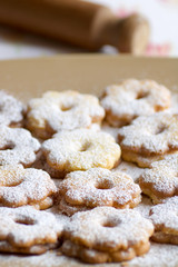 group of canestrelli biscuits covered of icing sugar on a plate
