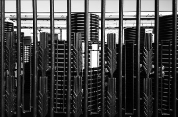 Dramatical black and white fence abstract city background