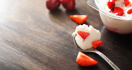Fresh yogurt with berries. Ice cream in a bowl with fresh and ju