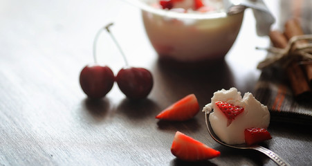 Fresh yogurt with berries. Ice cream in a bowl with fresh and ju