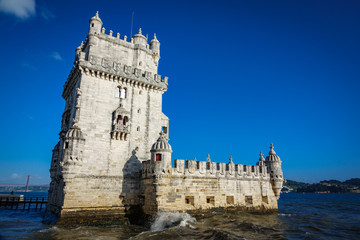 Fototapeta na wymiar Lisbon Torre de Belem against blue sky