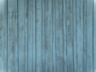 Fototapeta na wymiar Barn wood wall with distressed, peeling blue paint