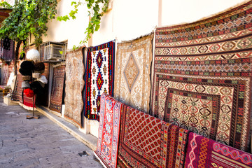 Sale of antique carpets on the streets of the Old City of Baku. Azerbaijan