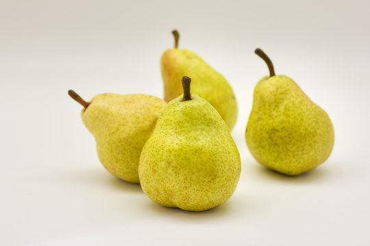 Yellow ripe pears isolated on white background