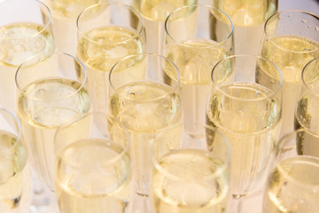 Champagne glasses at a party reception with selective focus