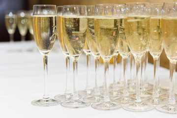 Champagne glasses at a party reception with selective focus