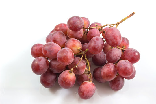 Red grape bunch, wine grapes isolated on white background, healthy fruit, Food concept.