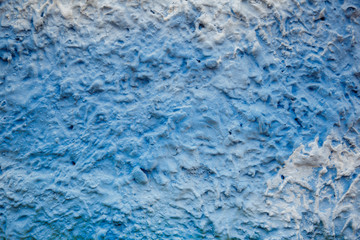 Blue and white decorative plaster on the wall like a sky. Art background