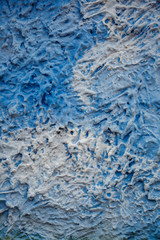 Blue and white decorative plaster on the wall like a sky. Art background