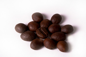 Coffee cup and beans on old kitchen table. Top view with copyspa