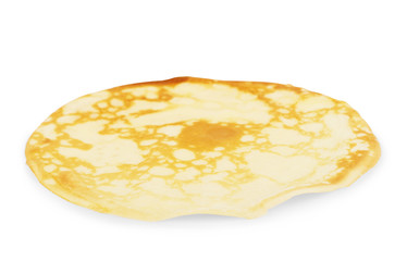 One sweet pancake on a white background
