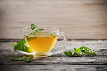 tea with melissa on old wooden background
