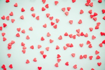 Light background with red hearts.