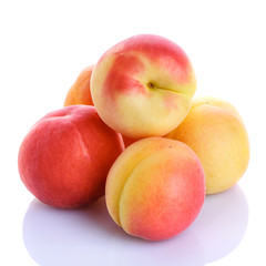 Fototapeta na wymiar Fresh organic peaches isolated on white background