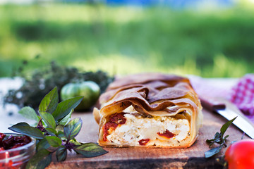 Strudel with cheese and sun-dried tomatoes.