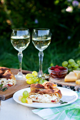 Strudel with cheese and sun-dried tomatoes.
