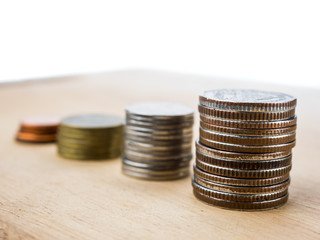 coins and money for finance and banking  on wood white background