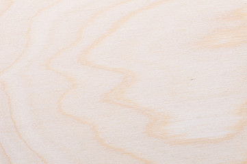 Fototapeta na wymiar background texture of a freshly cut light-wood with wavy lines
