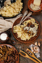 Pasta fettuccine with mushrooms and meat