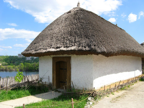 one house in traditional of the Slavs character with a thatched roof
