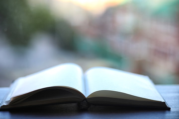 open book and a table