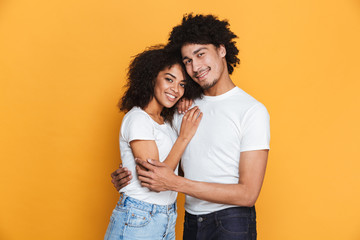 Portrait of a lovely young afro american couple hugging