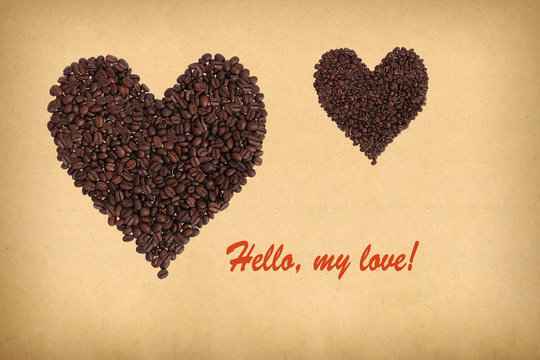 Fototapeta Two hearts composed of coffee beans. Inscription Hello, my love! Concept of coffee in retro style.