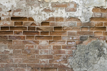 old, shabby, destroyed red brick wall