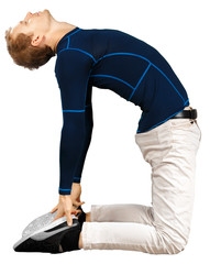 Flexible sporty young man doing stretching exercises isolated on white background