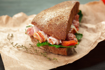 sandwich on a wooden table