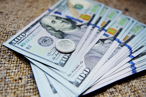One Russian Ruble Against The Background Of Dollars Exchange Rates One Russian Ruble Against The Background Of Dollars Exchange Rates Fall