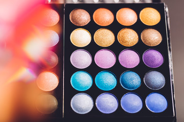 Eyeshadow palette with colorful eyeshadows.