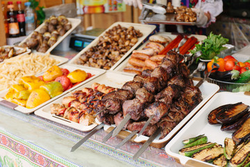 Shish kebab. Grilled kebab on metal skewer. Street food.