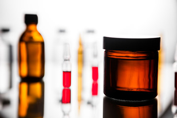 Group of ampoules with a transparent medicine in medical laboratory