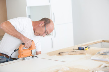 Experienced carpenter working on a project