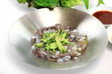 Sliced Raw Octopus Sashimi.