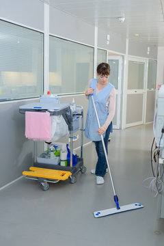 Janitor Mopping The Floor