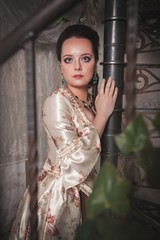 Beautiful woman in old historic medieval dress