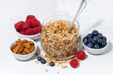 healthy breakfast. granola and fresh berries on white background