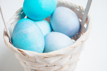 Beautiful easter eggs in blue tones. Selective focus. Shallow depth of field.