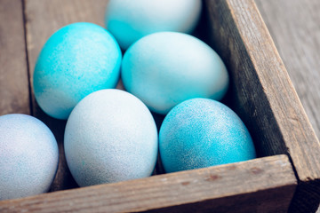 Beautiful easter eggs in blue tones. Selective focus. Shallow depth of field.