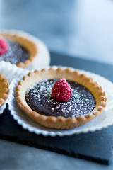 chocolate tart with raspberry on top