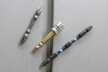 Fototapeta premium Driver bits, different bits for screwdriver, tools for household use for improving home or woodworking