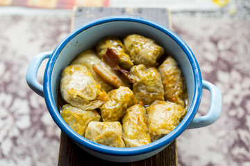 Sarma , traditional Balkan and Eastern European holiday food - rolled up cabbage leaves stuffed with rice and minced meat