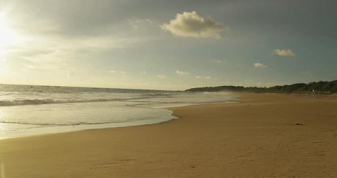 Exotic landscape of Pangumbahan beach with white sand and clear sky on dusk time at Ujung Genteng, Sukabumi, West Java, Indonesia. Shot in 4k resolution