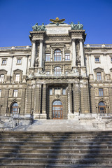Fototapeta na wymiar Hofburg Imperial Palace with blue sky background